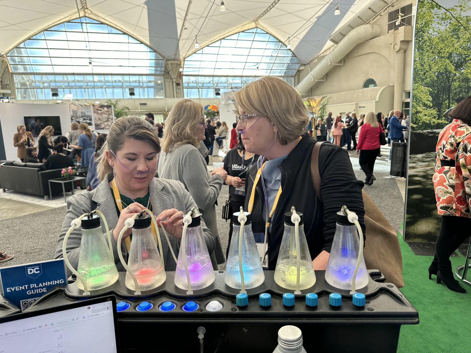 Guests trying the aromas in a bright convention hall